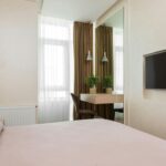 Make small bedroom look bigger