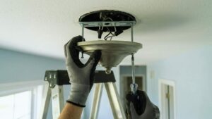 Unscrewing the Canopy and Mounting Bracket